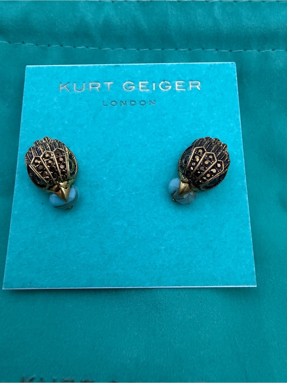 Kurt Geiger Antique Gold Peacock Feather Stud Earrings NWT includes KG Dust Bag